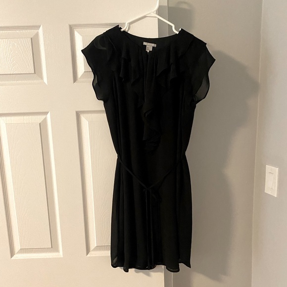 H&M short black dress with string tie waist and ruffle top. - Picture 1 of 4